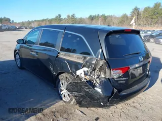 2017 Honda Odyssey SE with VIN 5FNRL5H32HB020340, listed as a IAAI auction lot 41884146 with 45,822 mi miles and . Bid and sale history available at carsss.com. Image 3.