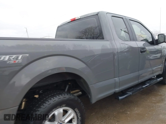 2018 Ford F-150 XL with VIN 1FTEX1EP1JFB25097, listed as a IAAI auction lot 41820009 with 137,138 mi miles and . Bid and sale history available at DreamBid. Image 13.