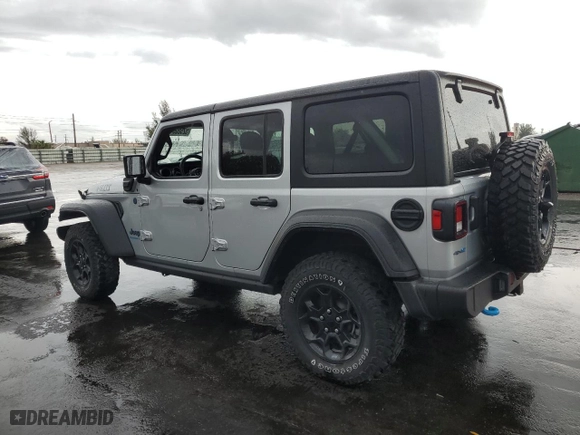 2023 Jeep Wrangler 4xe with VIN 1C4JJXN65PW661358, listed as a Copart auction lot 52500645 with 39,667 mi miles and Clean Title. Bid and sale history available at carsss.com. Image 2.