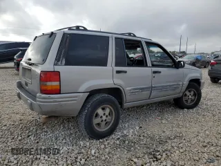 1998 Jeep Grand Cherokee with VIN 1J4FX48S6WC345358, listed as a Copart auction lot 85057454 with Not provided miles and Salvage title. Bid and sale history available at DreamBid. Image 3.