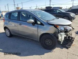 2015 Nissan Note S with VIN 3N1CE2CP4FL358297, listed as a Copart auction lot 59586475 with 53,252 mi miles and Salvage title. Bid and sale history available at DreamBid. Image 4.