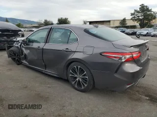 2019 Toyota Camry LE with VIN 4T1B11HK7KU248125, listed as a Copart auction lot 46953005 with 71,420 mi miles and Salvage Title. Bid and sale history available at carsss.com. Image 2.