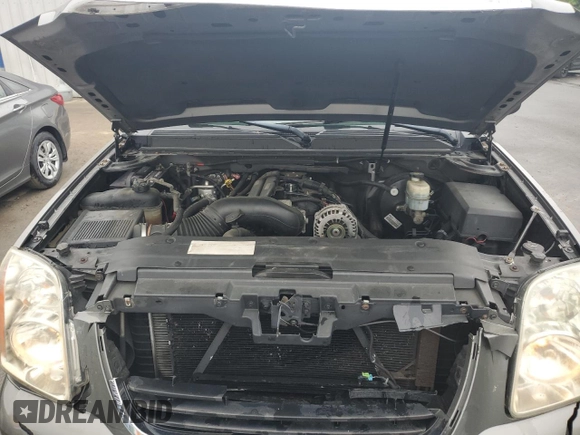 2007 GMC Yukon SLT with VIN 1GKFK13007J117446, listed as a Copart auction lot 55974665 with 204,785 mi miles and Salvage title. Bid and sale history available at DreamBid. Image 12.