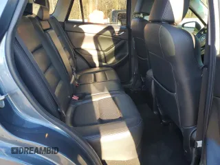 2015 Mazda CX-5 Grand Touring with VIN JM3KE2DY9F0483509, listed as a Copart auction lot 87406944 with 176,213 mi miles and Salvage Title. Bid and sale history available at carsss.com. Image 11.