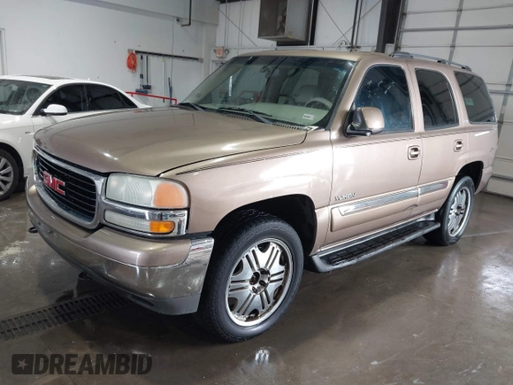 2004 GMC Yukon SLT with VIN 1GKEK13Z84R265500, listed as a IAAI auction lot 41412544 with 259,575 mi miles. Bid and sale history available at carsss.com. Image 2.