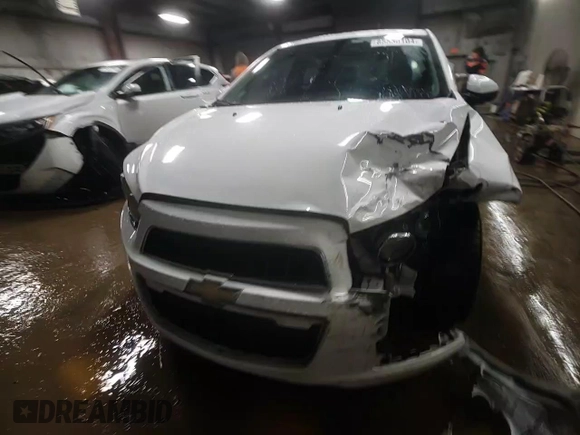 2014 Chevrolet Sonic LT with VIN 1G1JC6SH6E4239708, listed as a Copart auction lot 85530104 with 123,912 mi miles and Salvage Title. Bid and sale history available at carsss.com. Image 13.