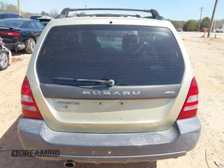 2003 Subaru Forester X z VIN JF1SG63613H715162, wystawiony jako IAAI lot #41897812 z przebiegiem 163 895 mil mil oraz . Historia ofert i sprzedaży dostępna na DreamBid. Obrazek 16.