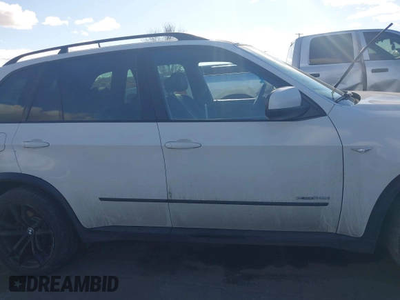 2012 BMW X5 35d with VIN 5UXZW0C56CL665631, listed as a IAAI auction lot 41055705 with 179,408 mi miles and . Bid and sale history available at DreamBid. Image 13.