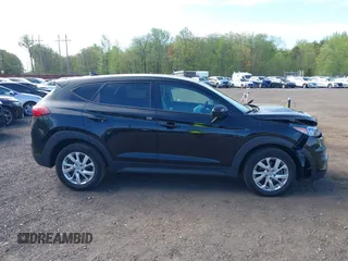 2019 Hyundai Tucson SE z VIN KM8J2CA4XKU042622, wystawiony jako IAAI lot #42146467 z przebiegiem 37 241 mil mil oraz . Historia ofert i sprzedaży dostępna na DreamBid. Obrazek 13.