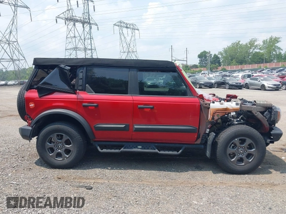 2023 Ford Bronco z VIN 1FMDE5BH8PLB24394, wystawiony jako IAAI lot #42449638 z przebiegiem 96 046 mil mil oraz . Historia ofert i sprzedaży dostępna na DreamBid. Obrazek 14.