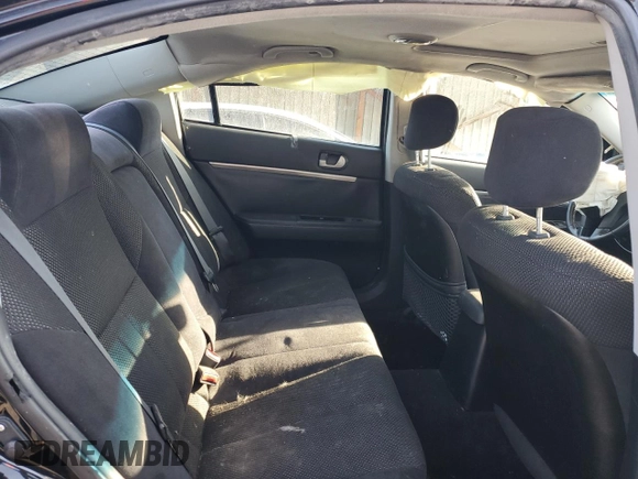 2009 Mitsubishi Galant ES z VIN 4A3AB36F19E006432, wystawiony jako Copart lot #57497935 z przebiegiem Nie podano mil oraz Nie do naprawy • Non repairable. Historia ofert i sprzedaży dostępna na DreamBid. Obrazek 10.