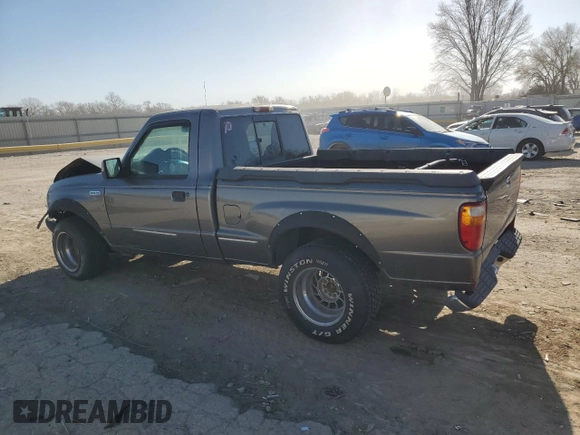 1999 Mazda B-Series Truck SX z VIN 4F4YR12C5XTM24067, wystawiony jako Copart lot #85241964 z przebiegiem 219 030 mil mil oraz Szkoda całkowita • Salvage title. Historia ofert i sprzedaży dostępna na DreamBid. Obrazek 2.