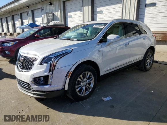 2021 Cadillac XT5 FWD Premium Luxury with VIN 1GYKNCRS0MZ198199, listed as a Copart auction lot 83595494 with 27,923 mi miles and Salvage Title. Bid and sale history available at carsss.com. Image 1.