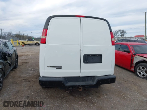 2014 Chevrolet Express Cargo Van with VIN 1GCWGGCA4E1209164, listed as a IAAI auction lot 41838141 with 174,770 mi miles. Bid and sale history available at carsss.com. Image 16.