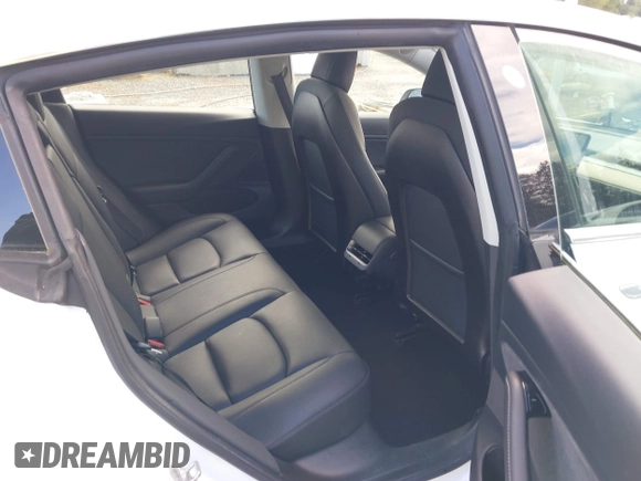 2020 Tesla Model 3 Long Range z VIN 5YJ3E1EB5LF619018, wystawiony jako IAAI lot #42131960 z przebiegiem 29 774 mil mil oraz . Historia ofert i sprzedaży dostępna na DreamBid. Obrazek 8.