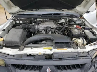 2003 Mitsubishi Montero Limited z VIN JA4NW51S23J020616, wystawiony jako Copart lot #56036365 z przebiegiem 200 785 mil mil oraz Szkody całkowita. Historia ofert i sprzedaży dostępna na DreamBid. Obrazek 12.