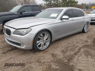 2011 BMW 7 Series 740Li with VIN WBAKB4C5XBC575254, listed as a IAAI auction lot 41617340 with 105,307 mi miles. Bid and sale history available at carsss.com. Image 2.
