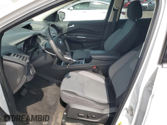 2017 Ford Escape SE z VIN 1FMCU0GD9HUE38848, wystawiony jako Copart lot #56859745 z przebiegiem 69 404 mil mil oraz Szkoda całkowita • Salvage title. Historia ofert i sprzedaży dostępna na DreamBid. Obrazek 7.