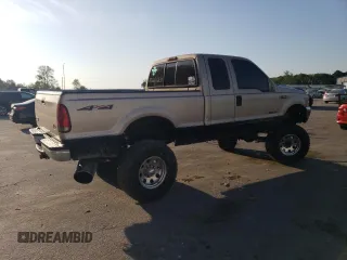 1999 Ford F-250 XL with VIN 1FTNX21F0XEE70963, listed as a Copart auction lot 52294955 with 218,969 mi miles and Salvage title. Bid and sale history available at DreamBid. Image 3.