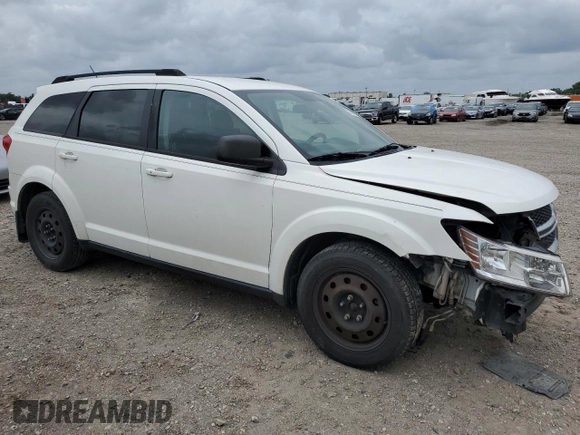 2014 Dodge Journey SE with VIN 3C4PDCAB7ET240936, listed as a Copart auction lot 55115645 with 242,155 mi miles and Salvage title. Bid and sale history available at DreamBid. Image 4.