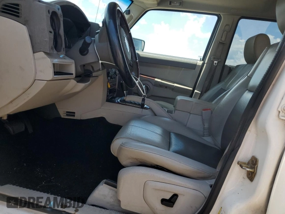 2007 Jeep Commander Limited z VIN 1J8HH582X7C507939, wystawiony jako Copart lot #64052895 z przebiegiem Nie podano mil oraz Szkoda całkowita • Salvage title. Historia ofert i sprzedaży dostępna na DreamBid. Obrazek 7.