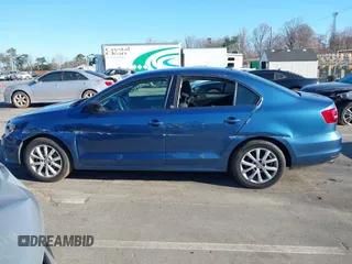 2015 Volkswagen Jetta SE z VIN 3VWD07AJ4FM285676, wystawiony jako IAAI lot #41787061 z przebiegiem 142 537 mil mil oraz . Historia ofert i sprzedaży dostępna na DreamBid. Obrazek 13.