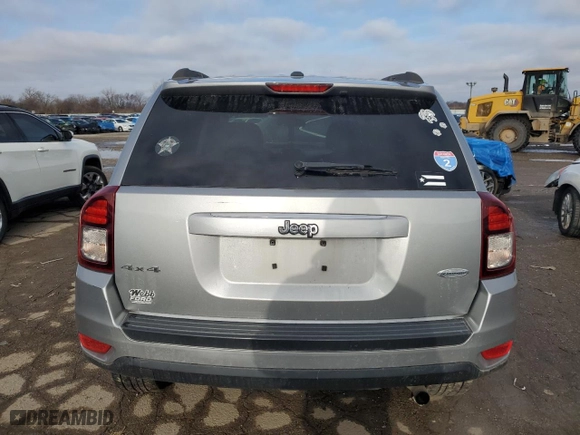2016 Jeep Compass Latitude with VIN 1C4NJDEB8GD757624, listed as a Copart auction lot 84997714 with 140,906 mi miles and Salvage Title. Bid and sale history available at carsss.com. Image 6.