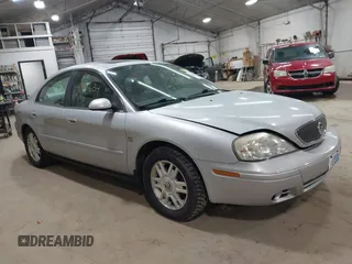 2004 Mercury Sable LS Premium with VIN 1MEFM55S04A628323, listed as a IAAI auction lot 41888634 with 70,725 mi miles. Bid and sale history available at carsss.com. Image 1.