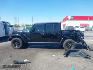 2023 Jeep Gladiator Freedom with VIN 1C6HJTAG1PL526229, listed as a IAAI auction lot 41972084 with 26,021 mi miles. Bid and sale history available at carsss.com. Image 14.