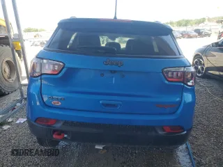 2022 Jeep Compass Trailhawk z VIN 3C4NJDDB1NT167161, wystawiony jako Copart lot #55769615 z przebiegiem 44 557 mil mil oraz Czysty tytuł • Clean title. Historia ofert i sprzedaży dostępna na DreamBid. Obrazek 6.