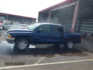 2001 Dodge Dakota Sport with VIN 1B7GL2AX01S133957, listed as a IAAI auction lot 41644558 with 156,008 mi miles. Bid and sale history available at carsss.com. Image 13.
