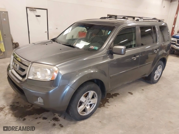 2011 Honda Pilot EX-L with VIN 5FNYF4H54BB079105, listed as a IAAI auction lot 41897414 with 270,648 mi miles. Bid and sale history available at carsss.com. Image 17.