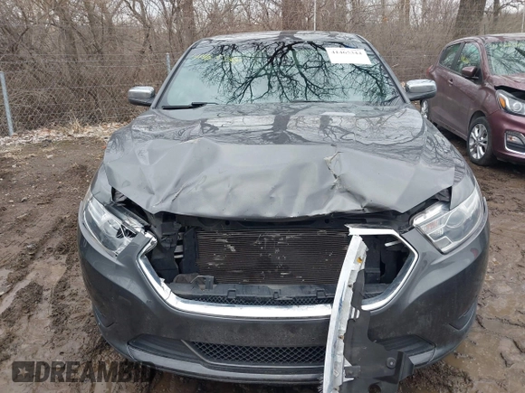 2015 Ford Taurus Limited with VIN 1FAHP2J88FG153326, listed as a IAAI auction lot 41465344 with 98,727 mi miles. Bid and sale history available at carsss.com. Image 12.