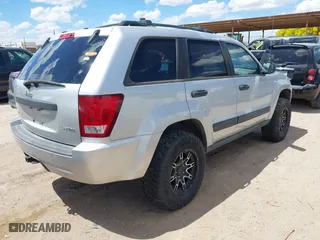 2005 Jeep Grand Cherokee Laredo with VIN 1J4GR48K15C542354, listed as a IAAI auction lot 41940355 with 158,065 mi miles. Bid and sale history available at carsss.com. Image 4.