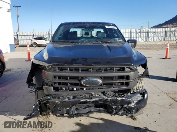 2023 Ford F-150 XL with VIN 1FTFW1E82PFD23843, listed as a Copart auction lot 49863045 with 21,721 mi miles and Salvage Title. Bid and sale history available at carsss.com. Image 5.