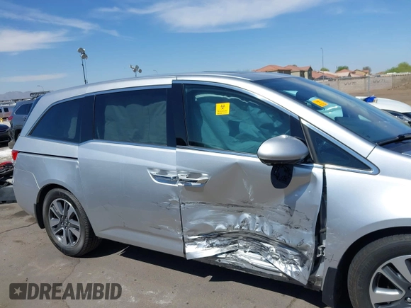 2014 Honda Odyssey Touring с VIN 5FNRL5H98EB070983, выставлен на аукционе IAAI как лот 42328380 с пробегом Не указан миль и . История ставок и продаж доступна на DreamBid. Изображение 6.