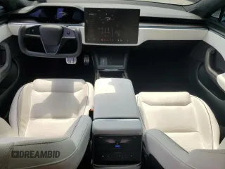 2022 Tesla Model S Plaid with VIN 5YJSA1E66NF460913, listed as a Copart auction lot 60534665 with 47,595 mi miles and Salvage title. Bid and sale history available at DreamBid. Image 8.