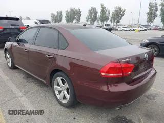 2013 Volkswagen Passat Wolfsburg Edition with VIN 1VWAP7A38DC136413, listed as a IAAI auction lot 42022470 with 265,221 mi miles. Bid and sale history available at carsss.com. Image 3.