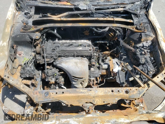 2004 Toyota Camry LE z VIN JTDBE32K740250691, wystawiony jako Copart lot #55793225 z przebiegiem Nie podano mil oraz Szkoda całkowita • Salvage title. Historia ofert i sprzedaży dostępna na DreamBid. Obrazek 11.
