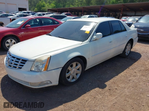 2006 Cadillac DTS w/1SC with VIN 1G6KD57Y36U116528, listed as a IAAI auction lot 42063595 with 128,839 mi miles. Bid and sale history available at carsss.com. Image 2.