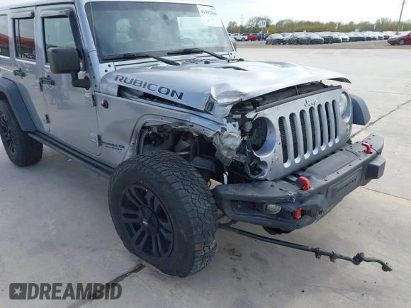 2015 Jeep Wrangler Unlimited Rubicon Hard Rock с VIN 1C4HJWFG6FL762537, выставлен на аукционе IAAI как лот 41792066 с пробегом 125 829 миль миль и . История ставок и продаж доступна на DreamBid. Изображение 6.