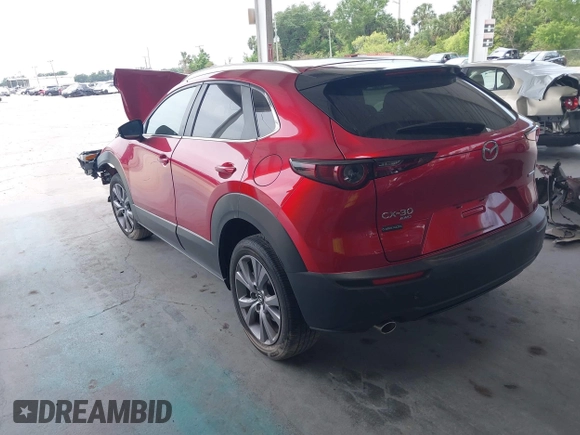 2023 Mazda CX-30 S Carbon Edition with VIN 3MVDMBCM3PM537841, listed as a IAAI auction lot 42080487 with 22,718 mi miles and . Bid and sale history available at DreamBid. Image 3.