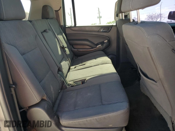 2018 Chevrolet Suburban LS z VIN 1GNSCGKC6JR249746, wystawiony jako Copart lot #55622105 z przebiegiem 126 378 mil mil oraz Szkoda całkowita • Salvage title. Historia ofert i sprzedaży dostępna na DreamBid. Obrazek 11.
