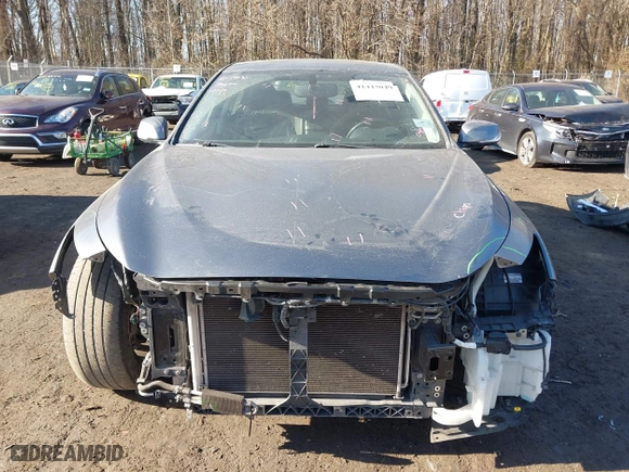 2015 Infiniti Q50 Premium with VIN JN1BV7AP4FM334762, listed as a IAAI auction lot 41443049 with 99,519 mi miles. Bid and sale history available at carsss.com. Image 13.