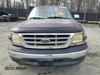 2001 Ford F-150 XL with VIN 1FTZX17211NA94099, listed as a Copart auction lot 50587055 with Not provided miles and Salvage title. Bid and sale history available at DreamBid. Image 5.