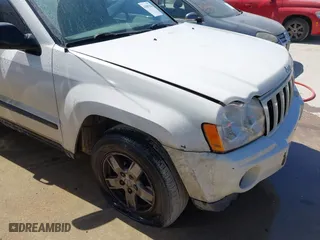 2007 Jeep Grand Cherokee Laredo with VIN 1J8HS48P37C658550, listed as a IAAI auction lot 41809384 with 1 mi miles. Bid and sale history available at carsss.com. Image 6.