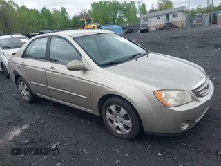 2006 Kia Spectra EX with VIN KNAFE121965337461, listed as a IAAI auction lot 42175939 with 229,723 mi miles. Bid and sale history available at carsss.com. Image 1.