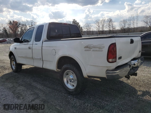 2000 Ford F-150 XL with VIN 1FTRX18L1YNB97492, listed as a Copart auction lot 48732055 with 315,898 mi miles and Salvage Title. Bid and sale history available at carsss.com. Image 2.