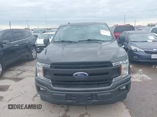 2018 Ford F-150 XL with VIN 1FTMF1C53JKE85608, listed as a IAAI auction lot 41823771 with 142,151 mi miles. Bid and sale history available at carsss.com. Image 12.