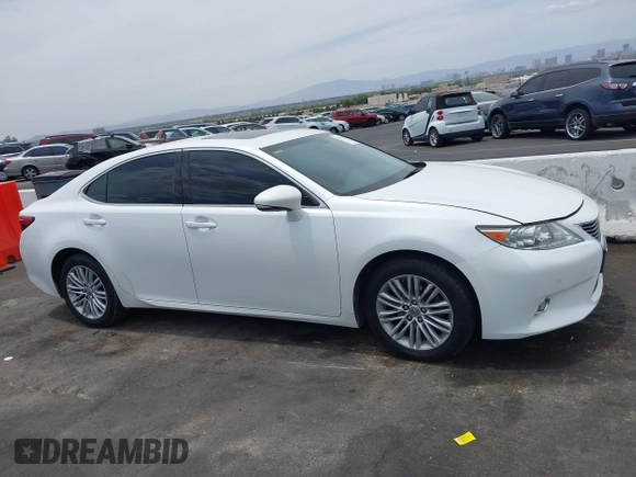 2014 Lexus ES 330 z VIN JTHBK1GG7E2101851, wystawiony jako IAAI lot #42576730 z przebiegiem 175 517 mil mil oraz . Historia ofert i sprzedaży dostępna na DreamBid. Obrazek 13.